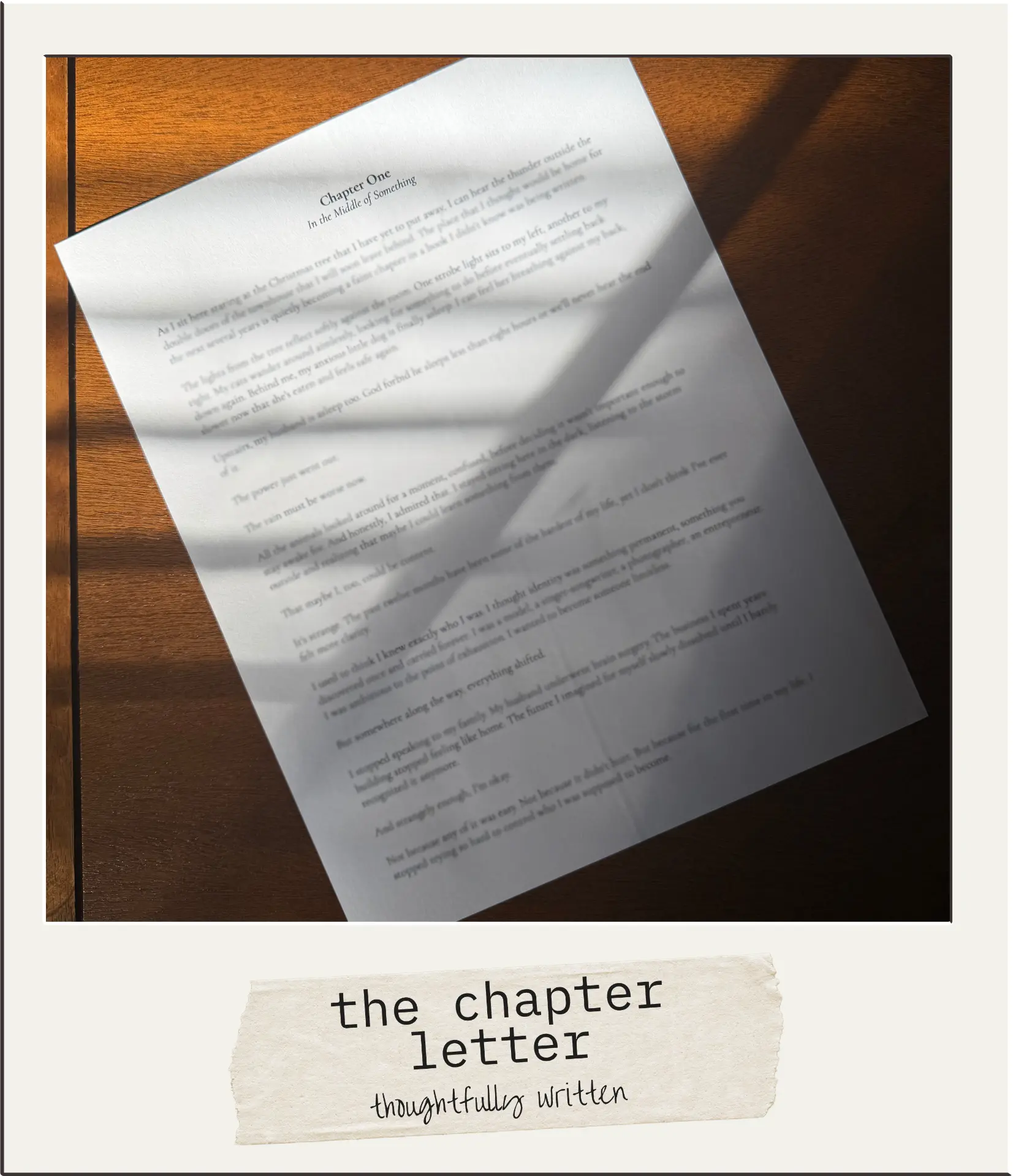 Polaroid of a printed chapter letter in window light